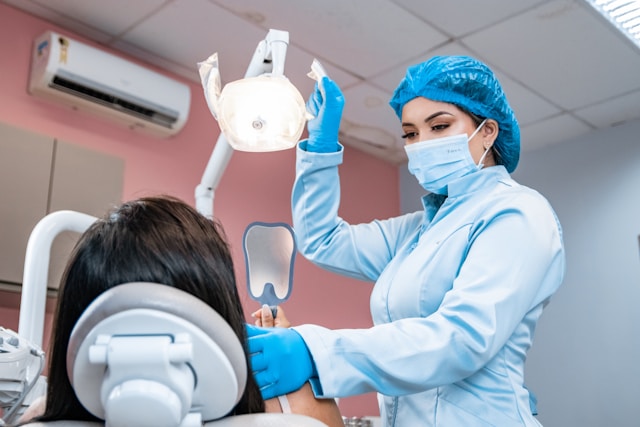A dentist examining a patient